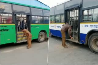 BMTC Driver, conductor cleaning Bus