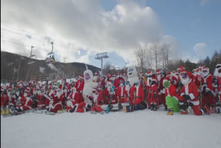 Skiing Santas hit the slopes in Maine