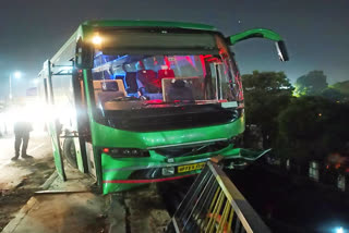 HRTC bus hanging on bridge railing