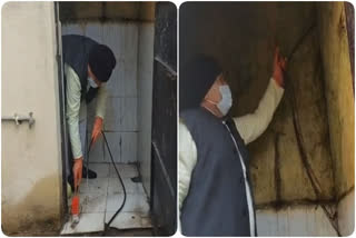 Minister sets example, cleans school toilet after complain