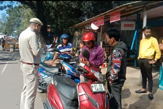 Drive against helmetless riders in Manja, Karbi Anglong