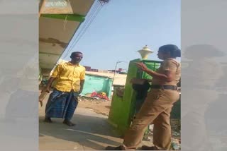 Two Police Woman threatened with a scythe