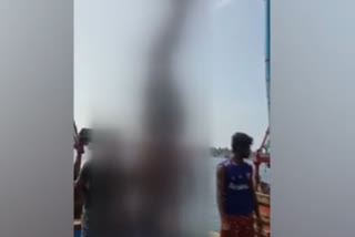 Fisherman hung upside down