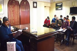 dc mandi held review meeting