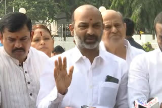 Bandi Sanjay about employees transfers, bjp leaders met governor