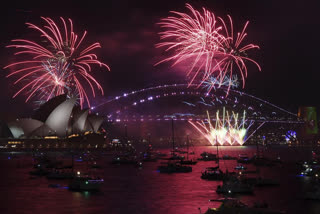 Australia went ahead with its celebrations despite an explosion in virus cases. Thousands of fireworks lit up the sky over Sydney’s Harbor Bridge and Opera House at midnight in a spectacular display.