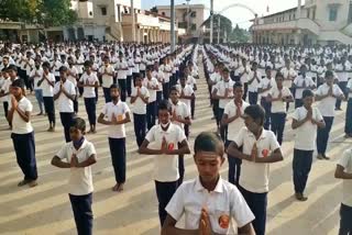 ten-thousand-childrens-did-mass-surya-namaskara-in-tumkuru