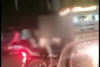 Kissing Stunts on Motorcycle