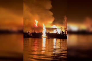 Srinagar two houseboats gutted during nocturnal fire incident in dal lake