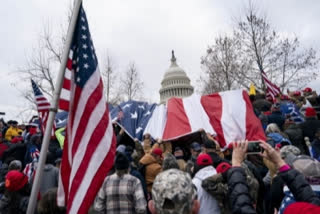 US AG vows to hold all Capitol riot 'perpetrators' accountable