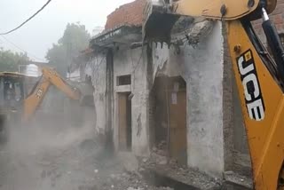 Sheopur police bulldozer on illegal house