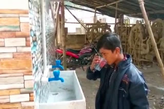 Man Install Purified Drinking Water Tank