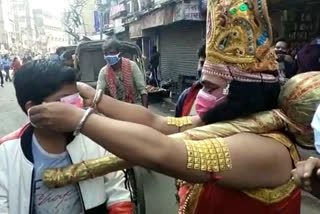 covid awareness campaign by hanuman in howrah market area