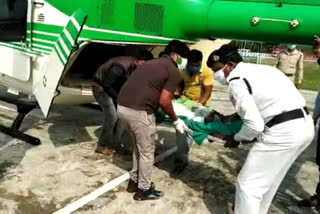 fire at ganga sagar mela, burnt woman brought to Howrah by air ambulance