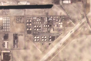 In this satellite image provided by Planet Labs PBC, white fire suppressing foam is seen after an attack on an Abu Dhabi National Oil Co. fuel depot in the Mussafah neighborhood of Abu Dhabi, United Arab Emirates, Monday, Jan. 17, 2022. A drone attack claimed by Yemen's Houthi rebels targeting a key oil facility in Abu Dhabi killed three people on Monday and sparked a fire at Abu Dhabi's international airport.