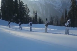 Indian Army patrols in heavy