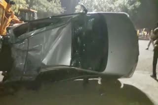 Container falls on Innova