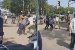 Fight with Traffic Police in Ahmedabad: બાપુનગરમાં વાહન રોકવા મામલે ACPની ઓફિસની બહાર જ ટ્રાફિક પોલીસ સાથે મારામારી