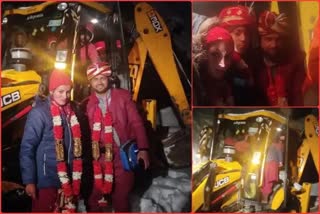 bride and groom takes jcb ride