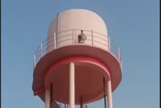 ujjain man climbed overhead tank