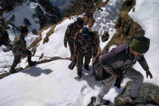 Chamoli Forest guard patrolling amidst snowfall