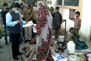 family staying outside collectorate in Sagar