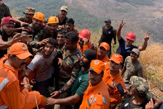 Youth trapped in hill cleft