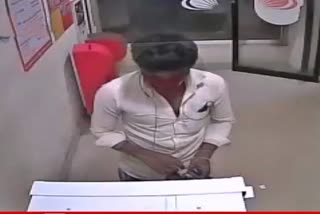 Thief attempting ATM theft caught red-handed