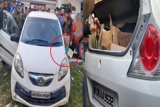 liquor recovered from bjp flag car in haridwar