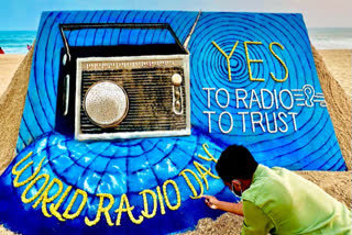 Sudarsan Pattnaik sculpted a beautiful sand art along the golden sea beach of Puri on the occasion of World Radio Day