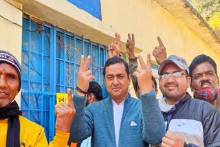 Anil Baluni casts his vote in his village