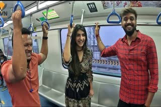 By two love movie team travelled in metro for their film promotion
