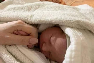 Ukrainian  woman birth to baby