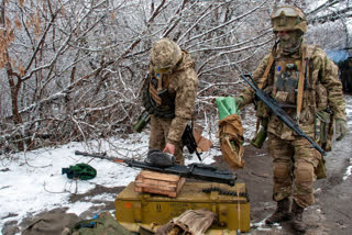 Russian troops enter Ukraine's 2nd-largest city, press ports