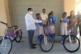 yadadri collector donated cycles to three students