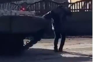 A Ukrainian man was seen stopping a Russian tank with his bare hands