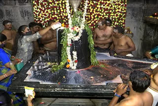 Devotees performing pujas