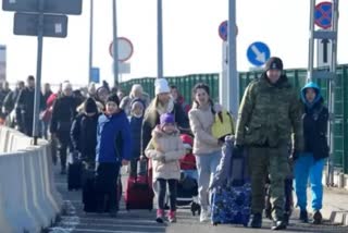 Nearly 875,000 people have fled Ukraine, UN says