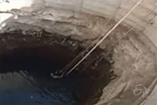 Mother and children jumps into well