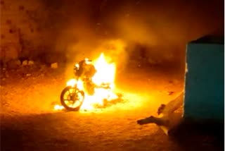 drunken youth set his bike on fire