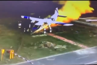 Watch Video Coastguard plane catches fire at Chakeri Airport