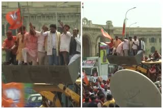 BJP workers celebrate on bulldozers in Lucknow