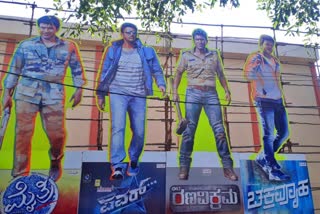 Actor Puneeth Raj Kumar Cutouts in front of cinema theatres