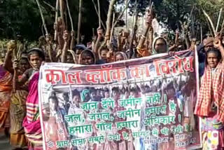 Villagers protest with conventional weapons against coal block allocation in Dumka