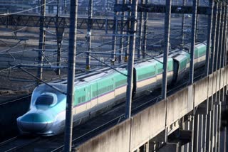 A train in the capital Tokyo rocking violently