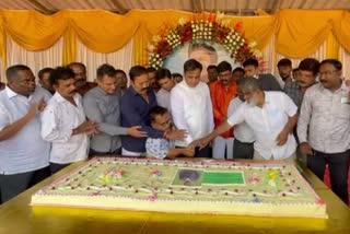 Minister cut the cake on behalf of Puneeth Birthday