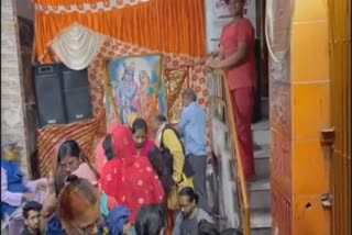 People played Holi with flowers in cave temple