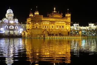 Devotees celebrate Hola Mohalla at Golden Temple in Amritsar, hola mohalla 2022, warrior holi, golden temple amritsar