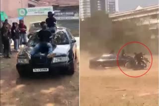 The car collided with the bike while showing the stunt