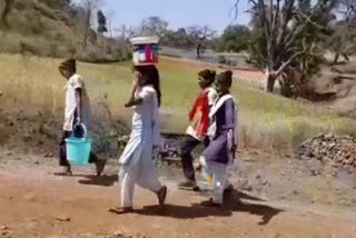 Chhindwara Children filling water at school